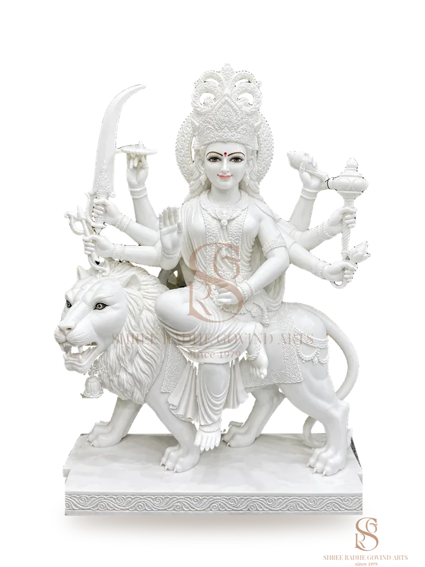 Durga Maa on her lion in white marble