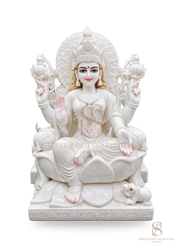 Lakshmi Maa seated on a lotus in white marble